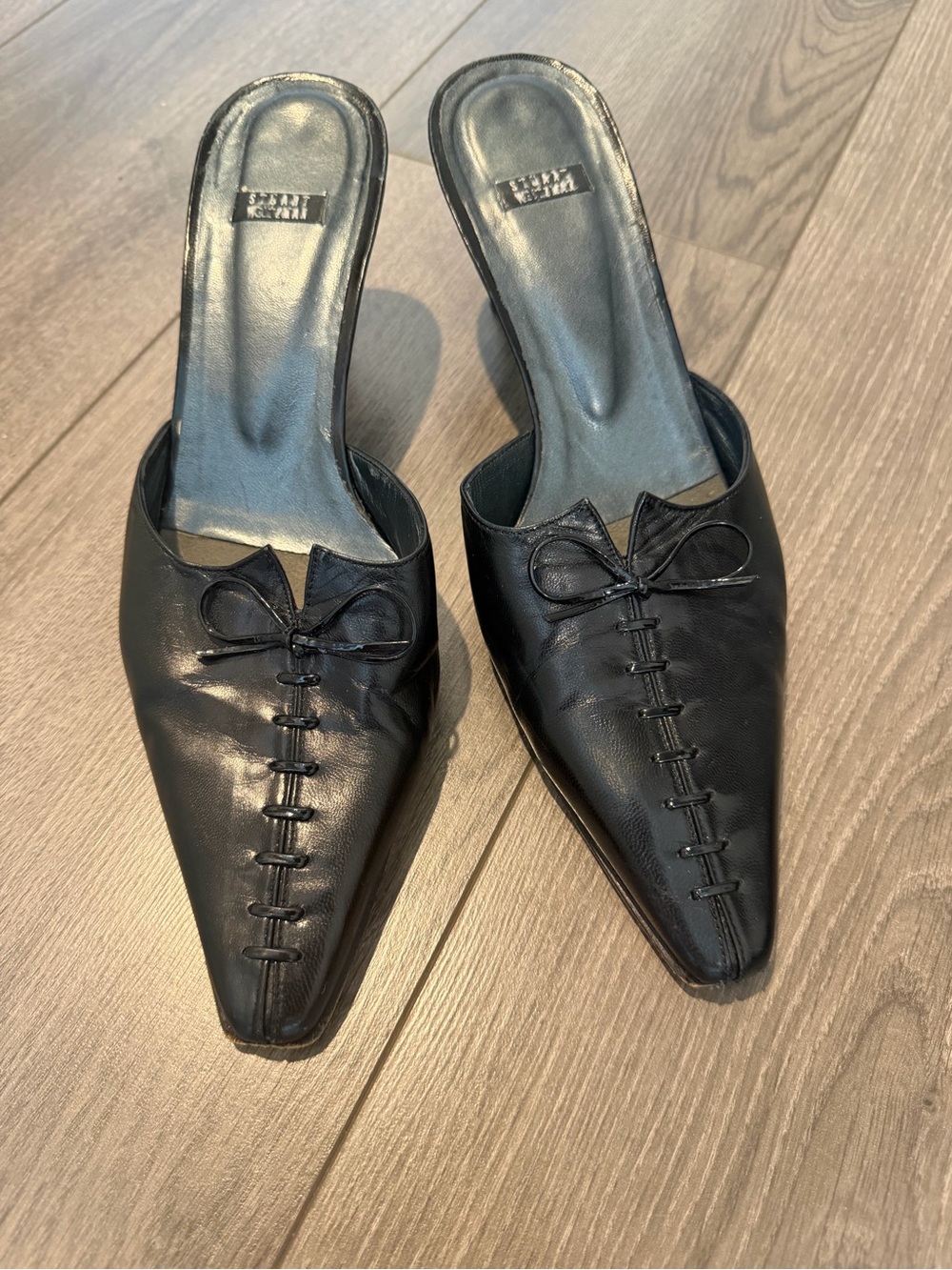 Stuart Weitzman Black Leather Slip-On Pointed Mules with Bow Detail